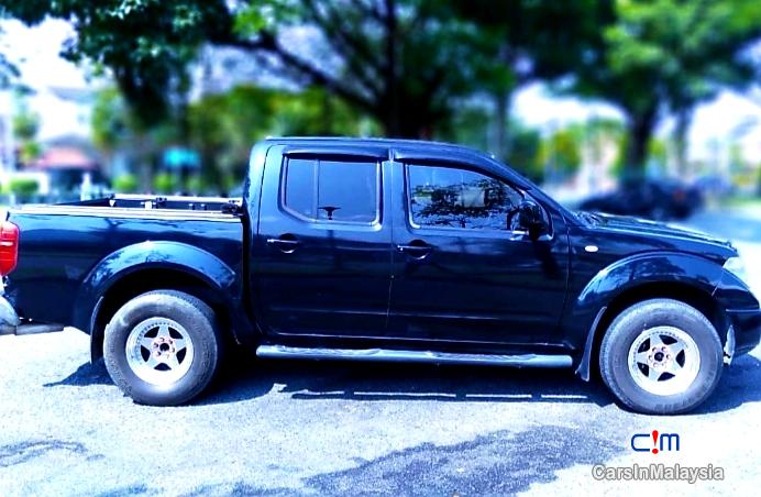 Nissan Navara 2.5-LITER DISEL TURBO 4X4 6 SPEED Manual 2013 - image 7