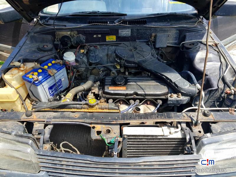 Proton Iswara 1.3-LITER FUEL ECONOMY AEROBACK CAR Manual 2001 - image 11