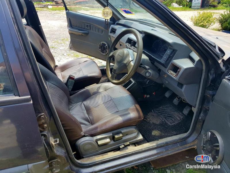 Proton Iswara 1.3-LITER FUEL ECONOMY AEROBACK CAR Manual 2001 - image 9