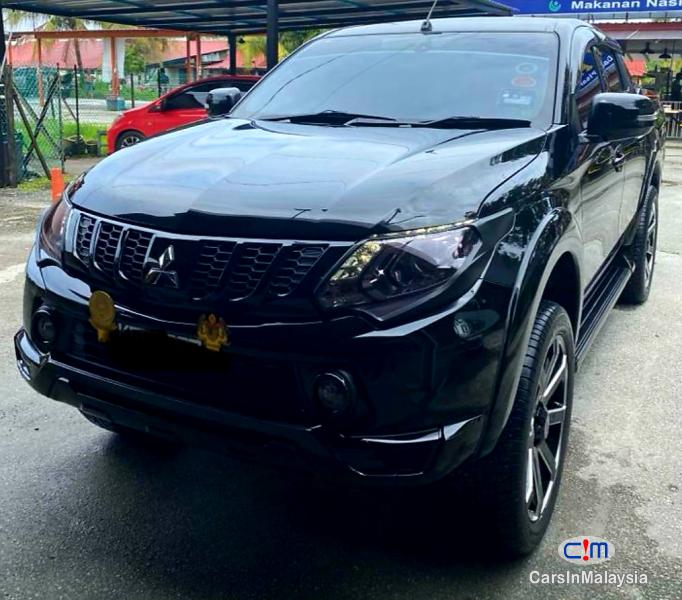 Mitsubishi Triton 2.5-LITER 4WD MIVEC DOUBLE CAB DIESEL TURBO Automatic 2018 in Malaysia
