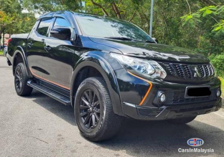 Mitsubishi Triton 2.4-LITER DOUBLE CAB MIVEC 4X4 DIESEL TURBO Automatic 2018 in Selangor