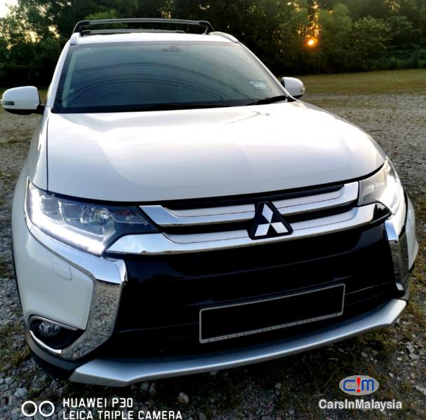 Mitsubishi Outlander 2.4-LITER LUXURY AWD CVT SUV 7 SEATER Automatic 2017 in Malaysia - image