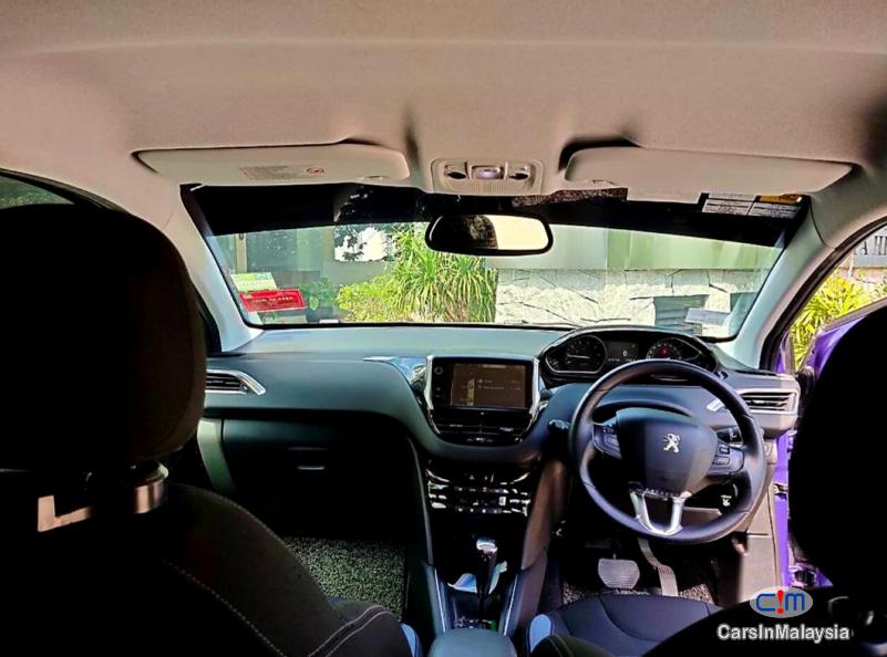 Peugeot 208 1.6-LITER TURBO HATCHBACK Automatic 2013 in Kuala Lumpur - image