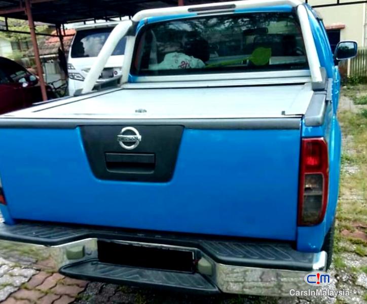 Nissan Navara 2.5-LITER 4X4 CAB CHASSIS DIESEL TURBO Automatic 2012 - image 4