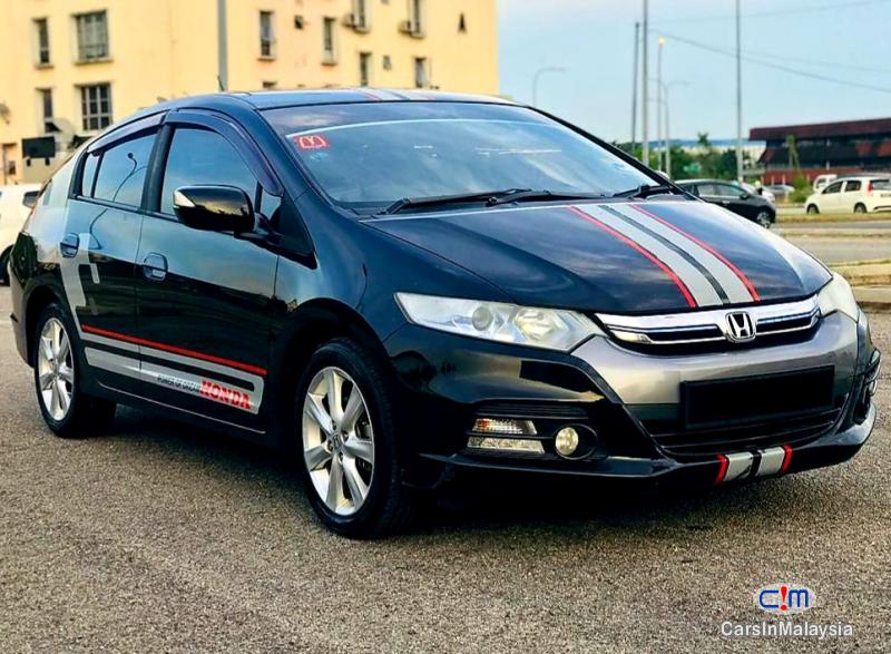 Pictures of Honda Insight 1.3-LITER HYBRID ECONOMY HATCHBACK Automatic 2014