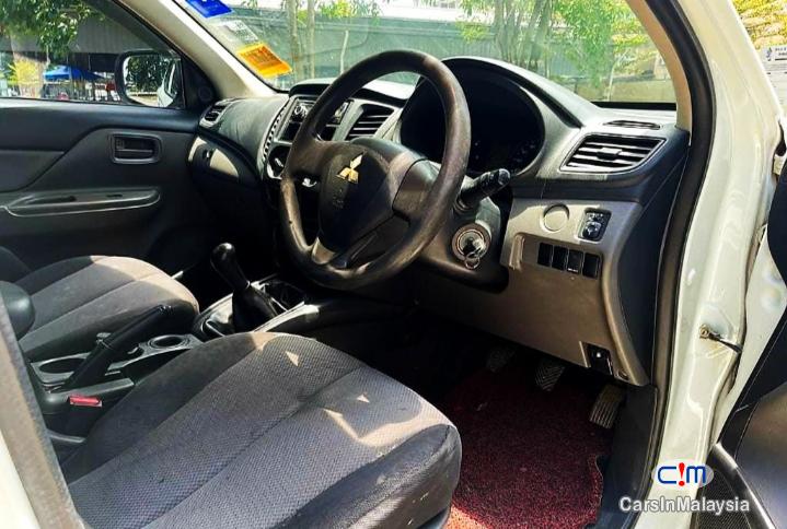 Mitsubishi Triton 2.5-LITER CAR CONTINUE LOAN Manual 2016 in Malaysia - image