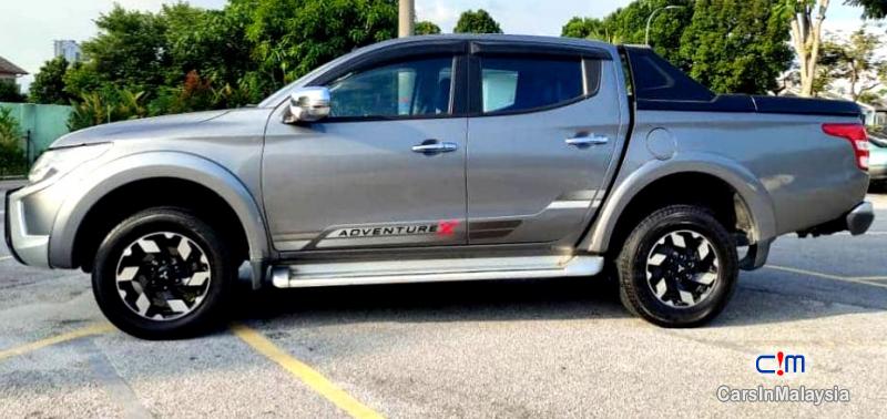 Mitsubishi Triton 2.4-LITER 4WD DOUBLE CAB 4X4 DIESEL TURBO Automatic 2017 in Malaysia