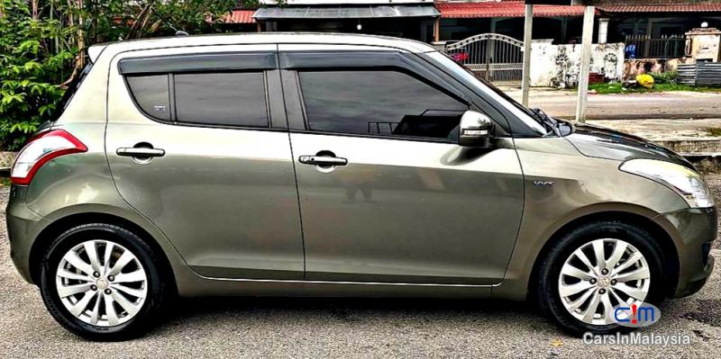 Suzuki Swift 1.4-LITER ECONOMY HATCHBACK Automatic 2015 - image 7