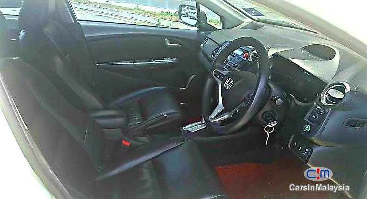 Honda Insight 1.4-LITER FUEL ECONOMY SEDAN HYBRID Automatic 2012 - image 4