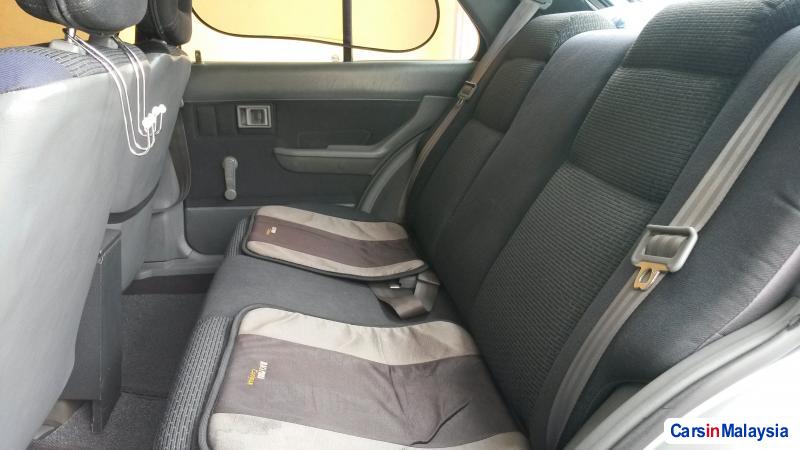 Proton Iswara - image 10