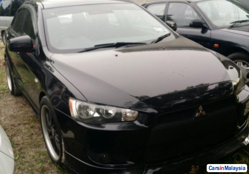 Picture of Mitsubishi Lancer 2.0-LITER LUXURY SEDAN Automatic 2012